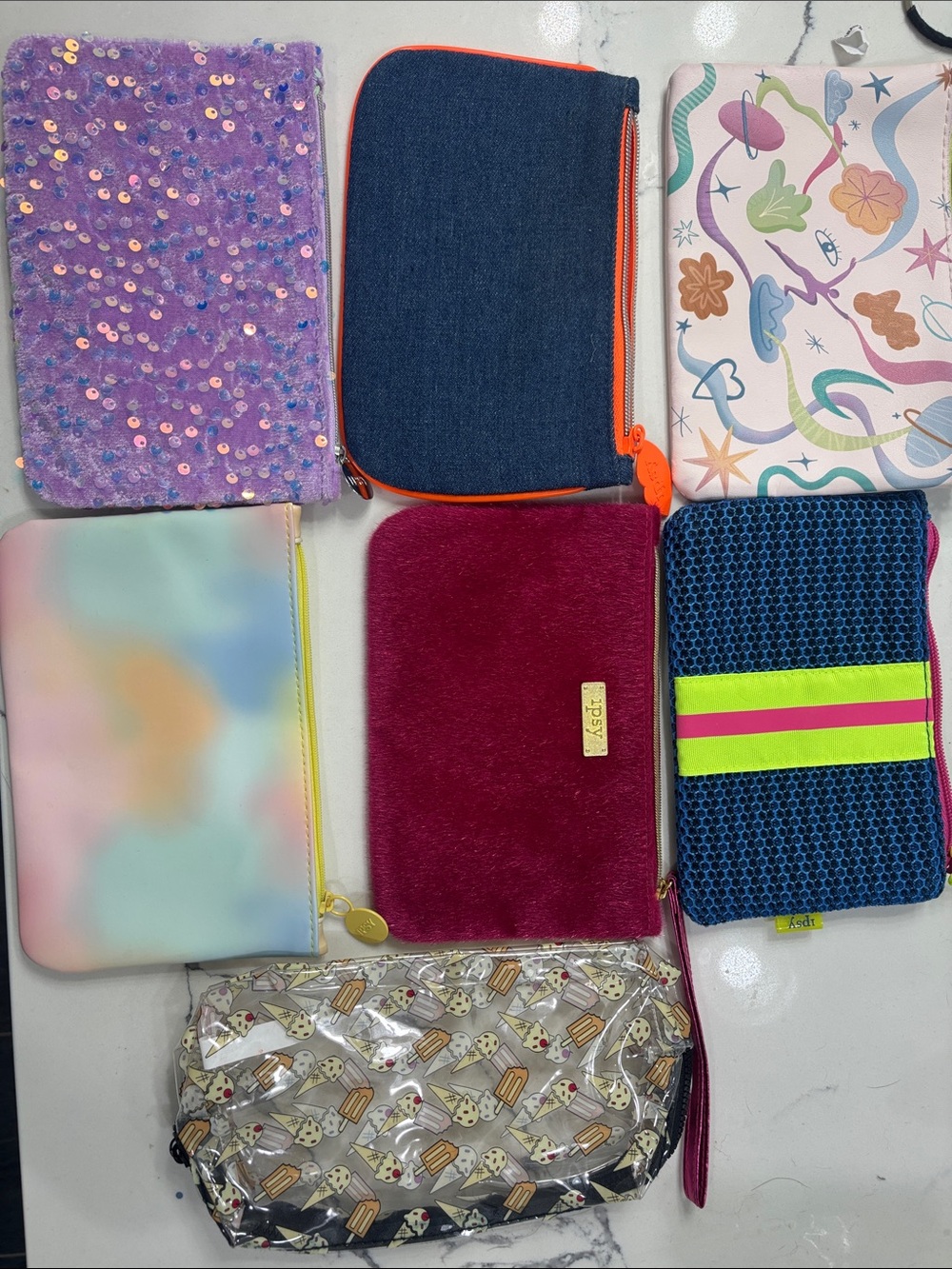 SEVEN Ipsy pouches